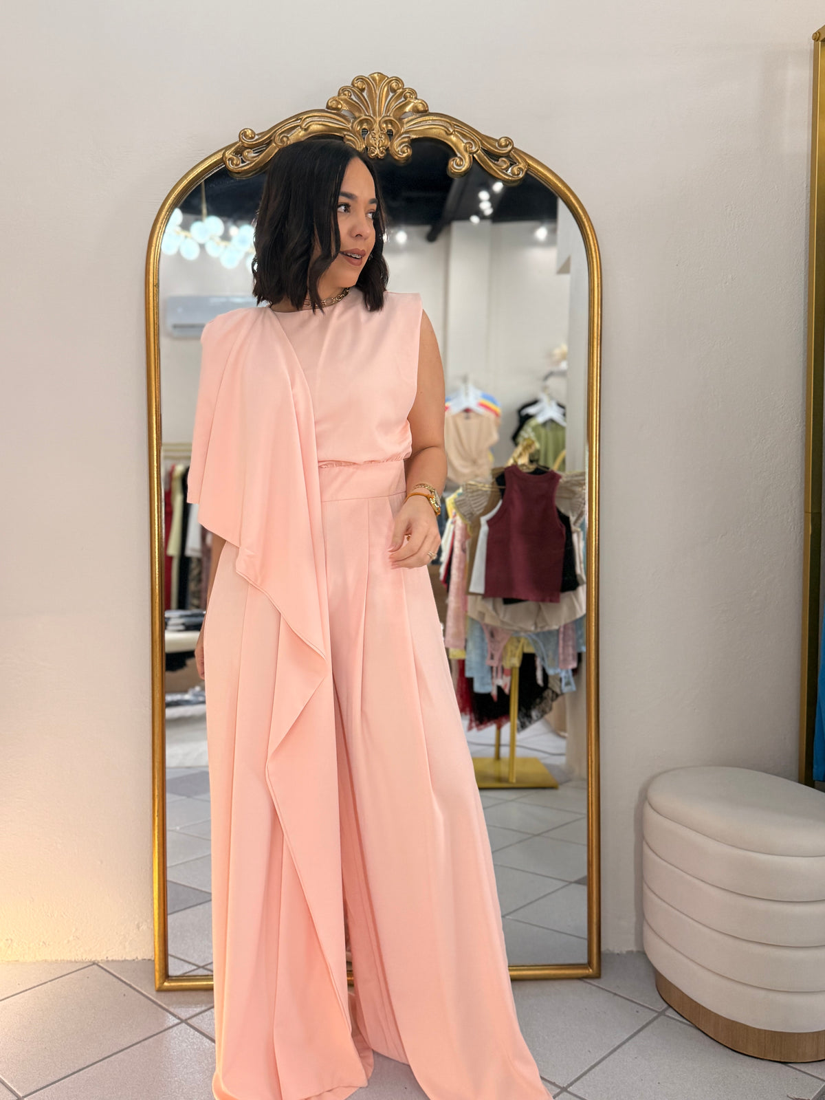 IN PEACH JUMPSUIT ELEGANTE