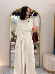 IN BEIGE JUMPSUIT ELEGANTE