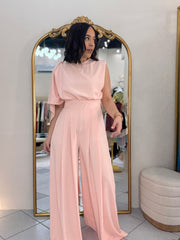 IN PEACH JUMPSUIT ELEGANTE