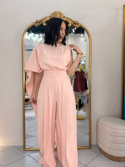 IN PEACH JUMPSUIT ELEGANTE